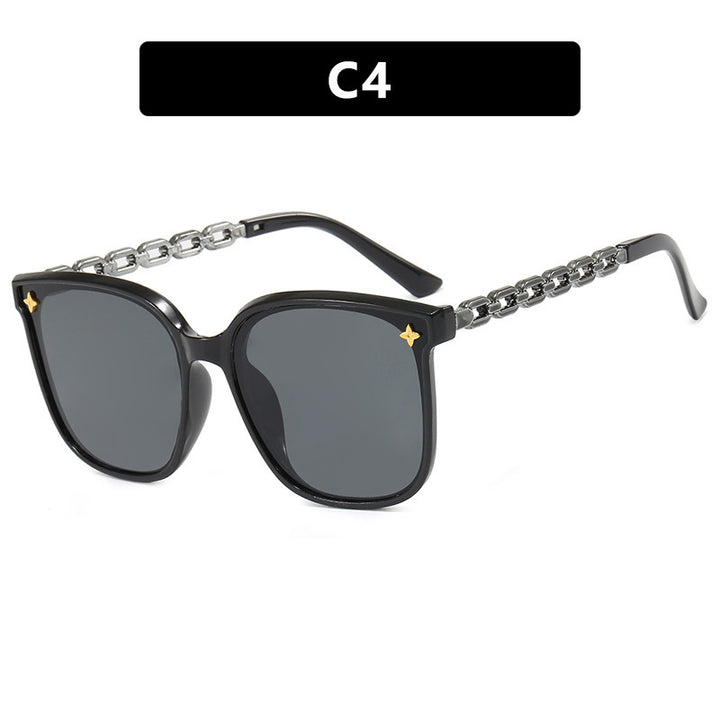 Dame moteriktig solbrille med stilige kjedeakenter Luvikno