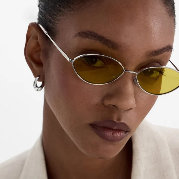 Dame moteriktig solbrille med ovalt design og polariserte linser Luvikno
