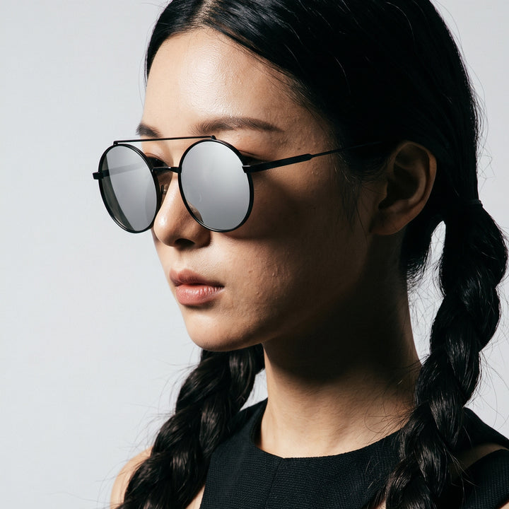 Dame rund solbrille med moteramme Luvikno