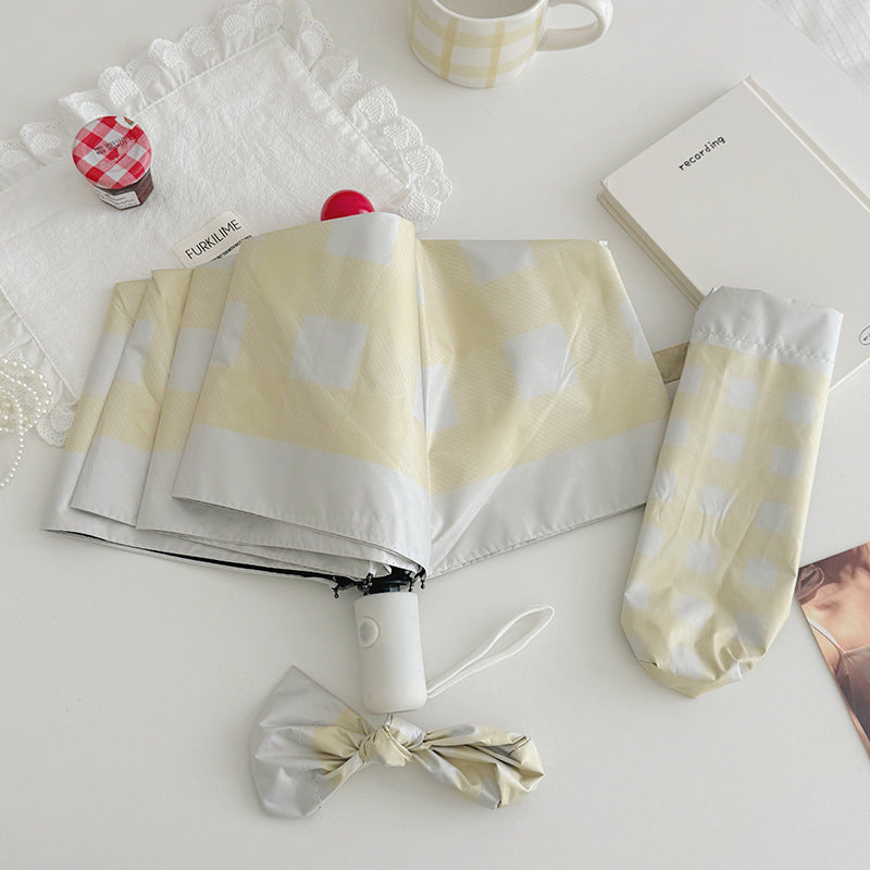 Dame sammenleggbart paraply med spesiell design Luvikno