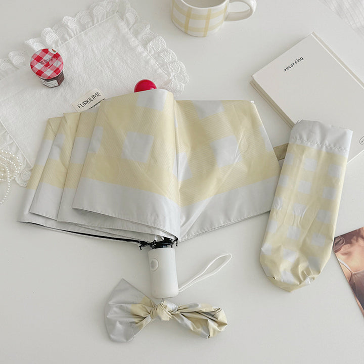 Dame sammenleggbart paraply med spesiell design Luvikno