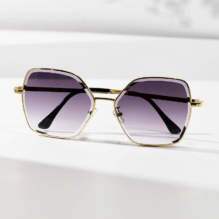 Dame geometrisk solbrille med fashionable gullramme Luvikno
