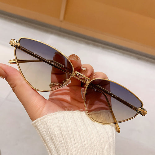 Dame designer solbrille med stilig cat-eye design og luksuriøs ramme Luvikno
