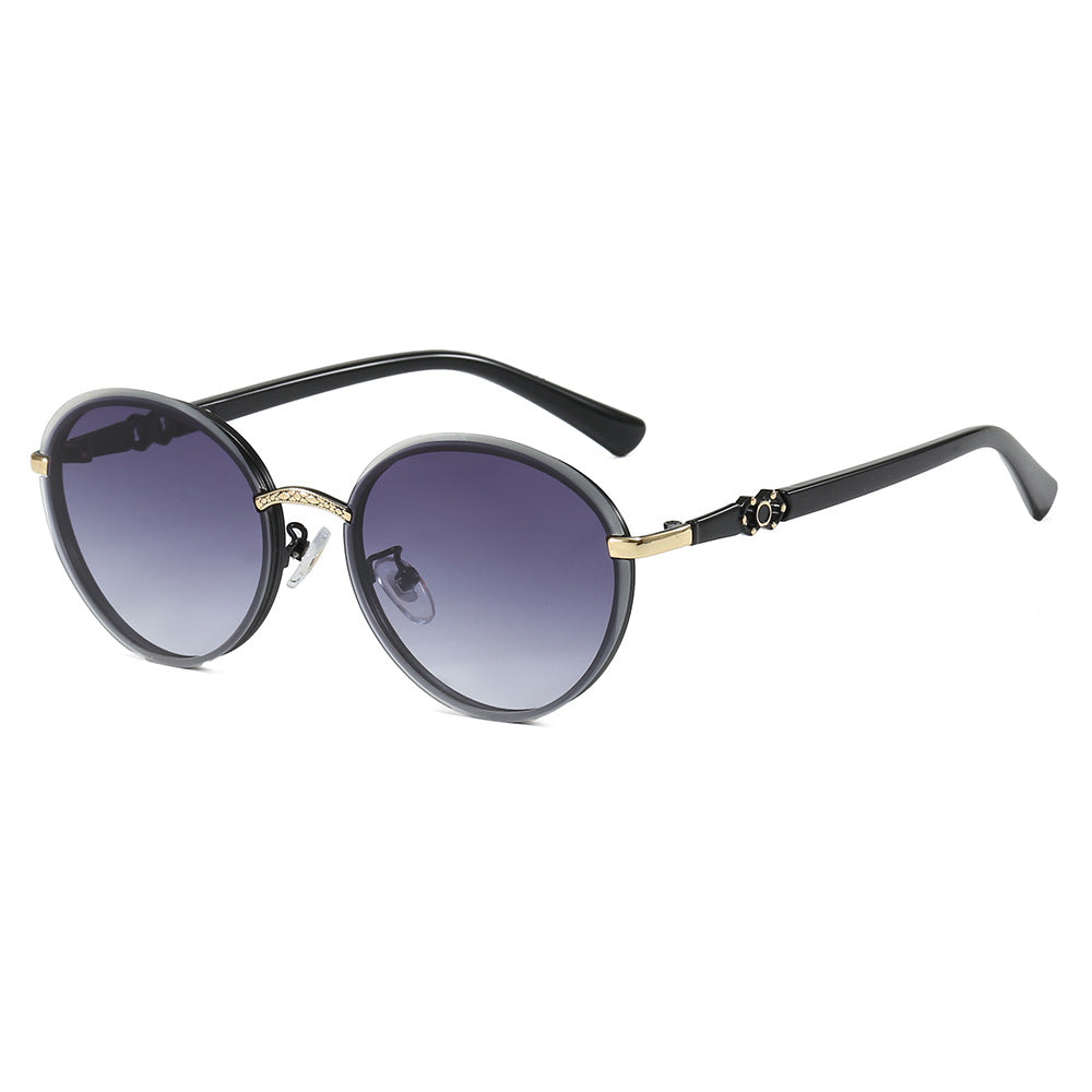 Dame elegant rund solbrille med speilende effekt Luvikno