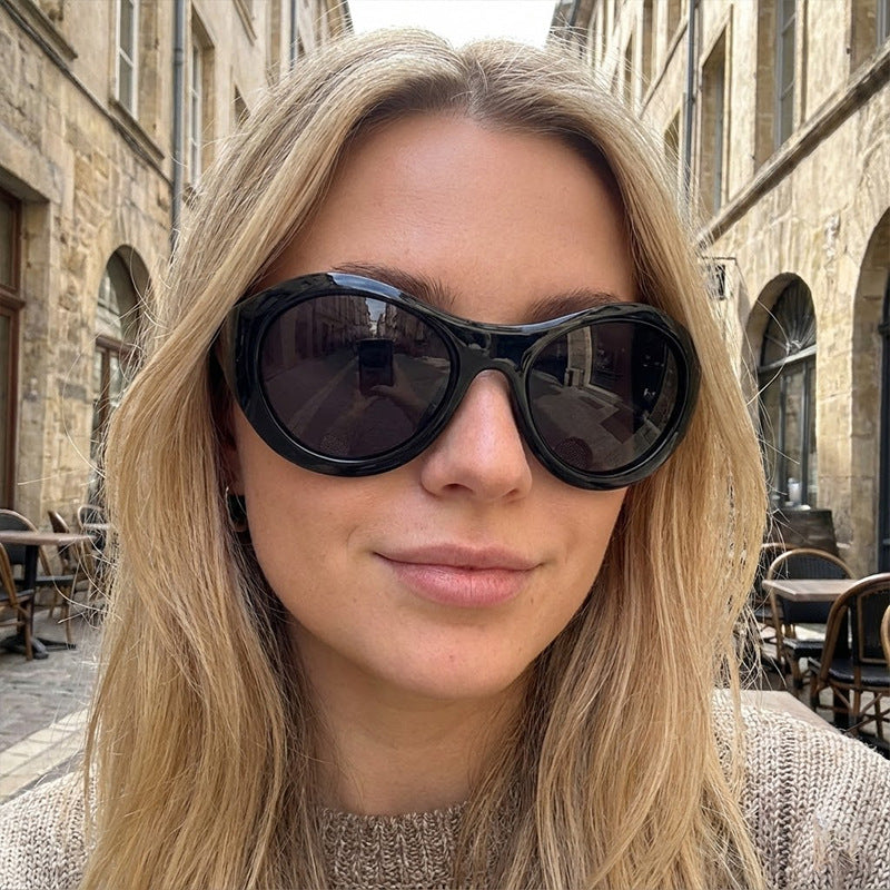 Dame Mote Oval Solbrille med gjennomsiktig ramme Luvikno