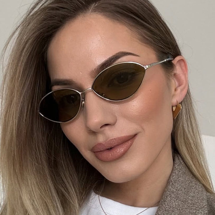 Dame moteriktig solbrille med ovalt design og polariserte linser Luvikno