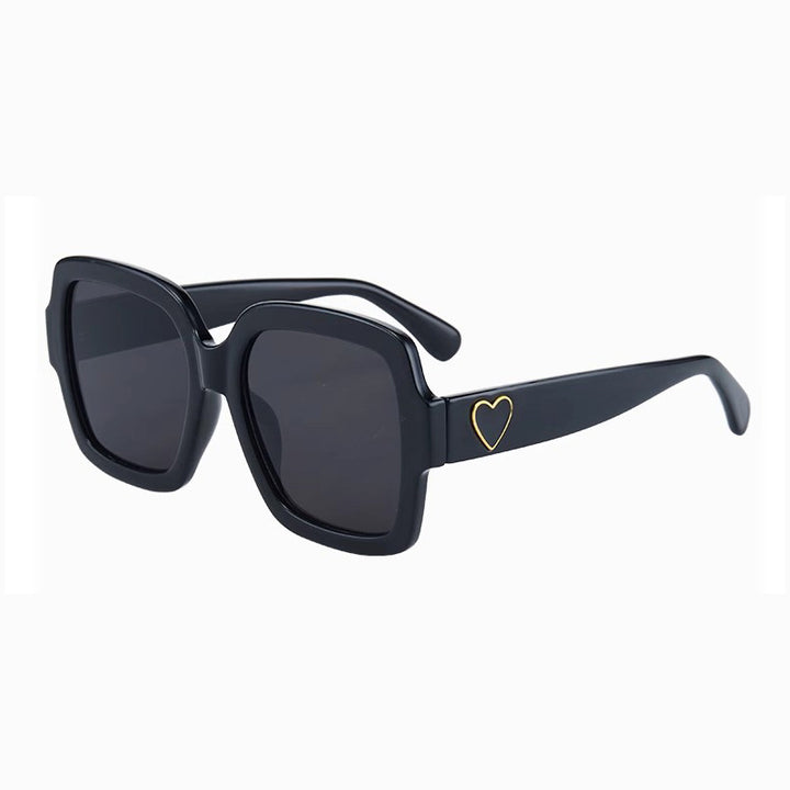 Dame Modemessig solbrille med eksklusiv hjerte-detalj Luvikno