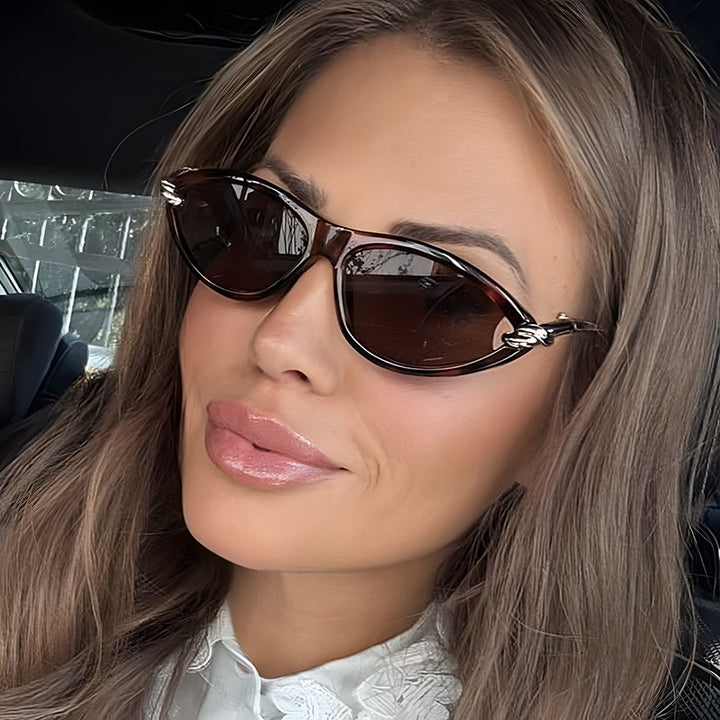 Damen Cat-Eye solbriller med elegant metallramme og beskyttende UV-filter Luvikno