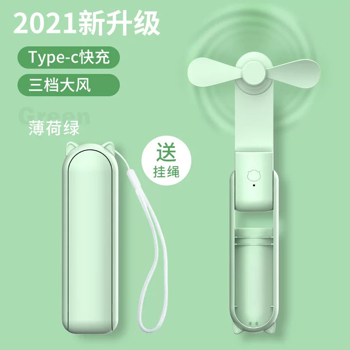 Unisex en størrelse sammenleggbar oppladbar trippel håndholdt mini vifte med innebygd powerbank USB-C og USB-A tilkoblinger samt håndleddsstropp Luvikno