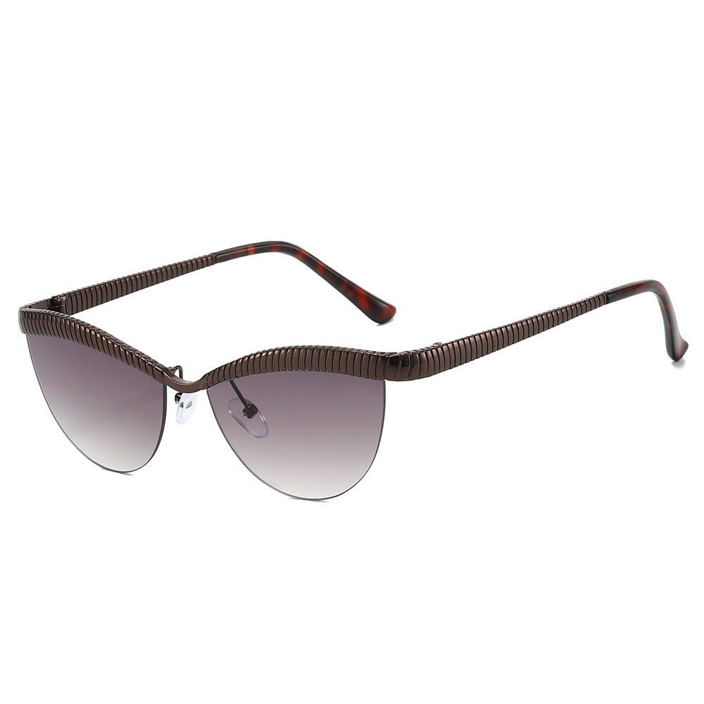Dame Designer solbrille med unikt, bølget ramme Luvikno
