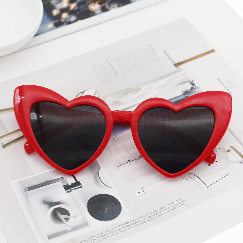 Dame hjerteformet solbrille med glitrende ramme Luvikno
