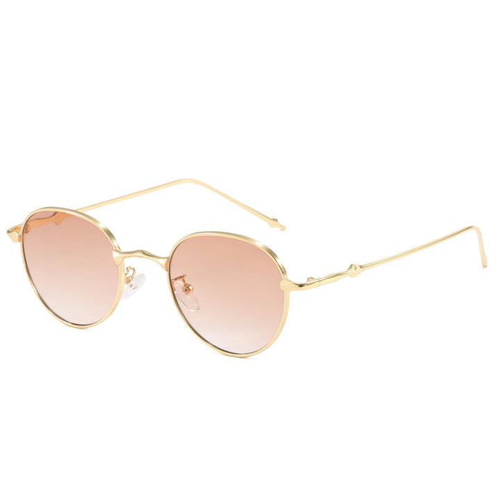 Dame elegante runde solbriller med moderne metallramme Luvikno