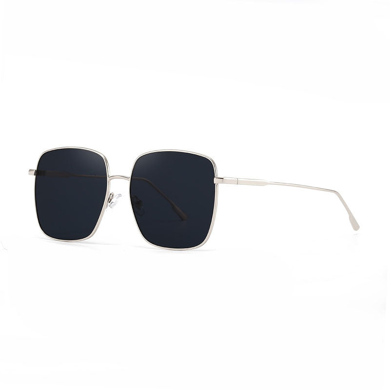 Dame solbrille med moderne firkantet rustfritt stålramme og polarisert glass Luvikno