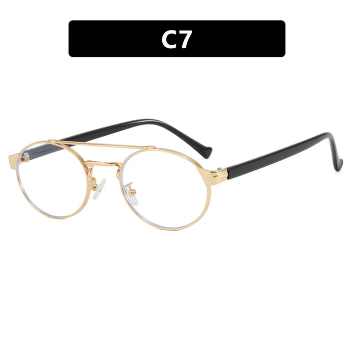 Dame moteriktig solbrille i stilfullt rundt design med gull aksenter Luvikno