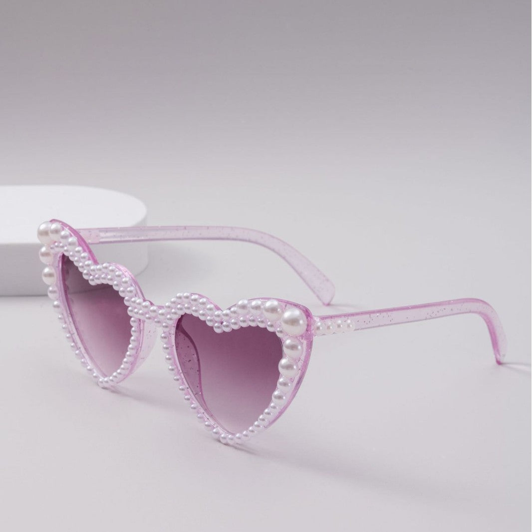 Dame designer solbrille med perleinnramming fra Luvikno