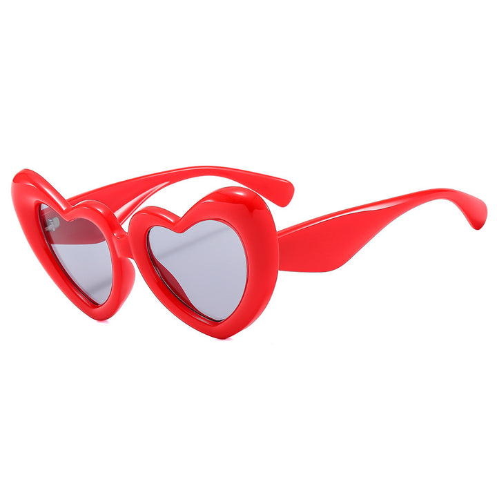 Dame Hjerteformet Solbrille med stilfull innramming Luvikno