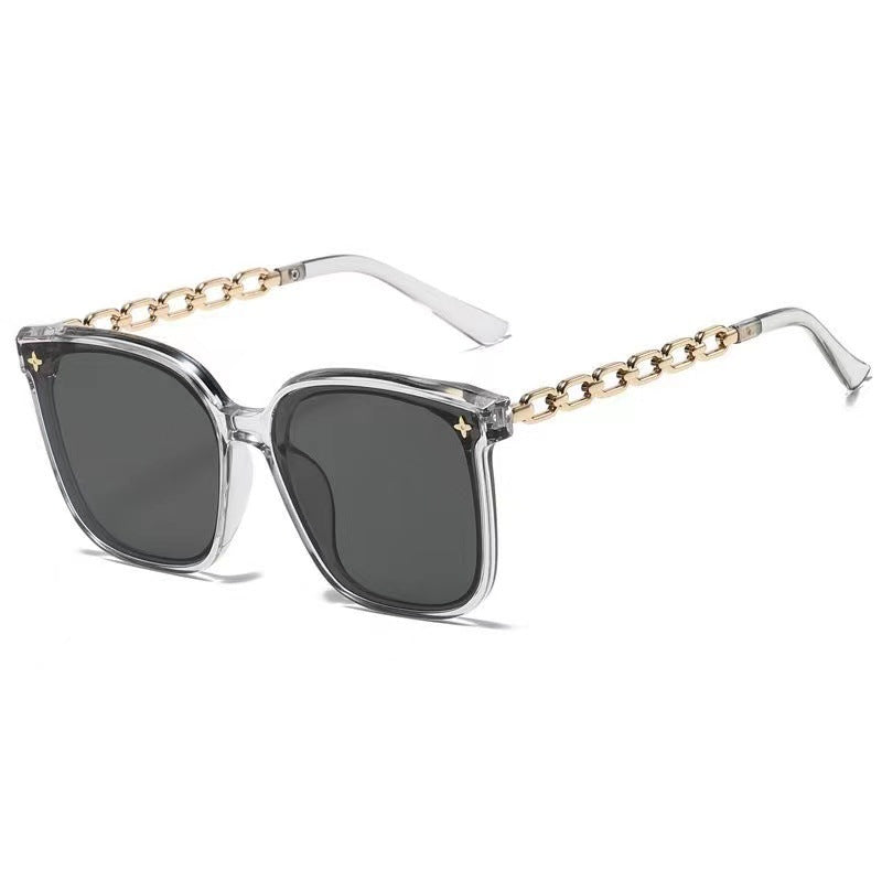 Dame ekstrastor solbrille med modig kjedeinnramming Luvikno