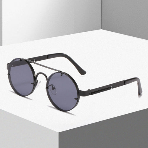 Dame rund designer solbrille med innovativ metallramme og beskyttende linser Luvikno
