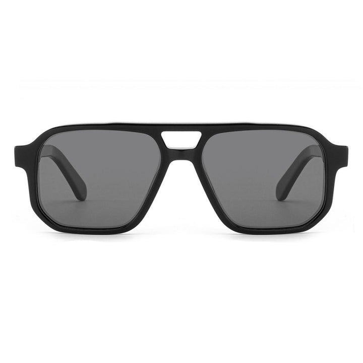 Dame solbrille i moderne, geometrisk design med robust ramme og UV-beskyttelse Luvikno
