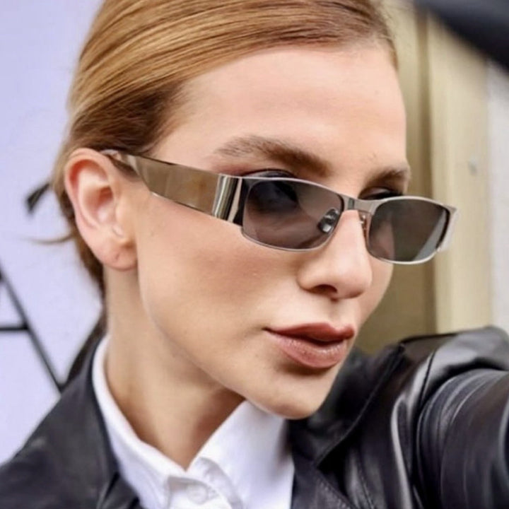 Dame moteriktig rektangulær solbrille med elegante glass Luvikno
