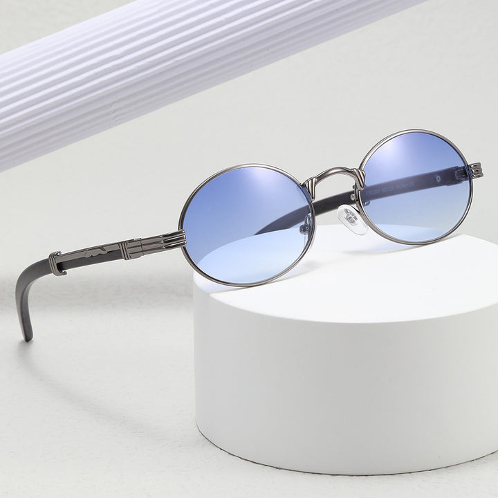 Dame rund designer solbrille med innovativ metallramme Luvikno