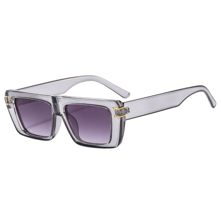 Dame moteriktig kvadratisk solbrille med glitrende akenter Luvikno