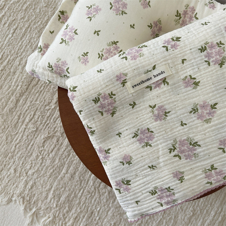 Unisex allsidig muslinteppe med blomstrete detaljer Luvikno