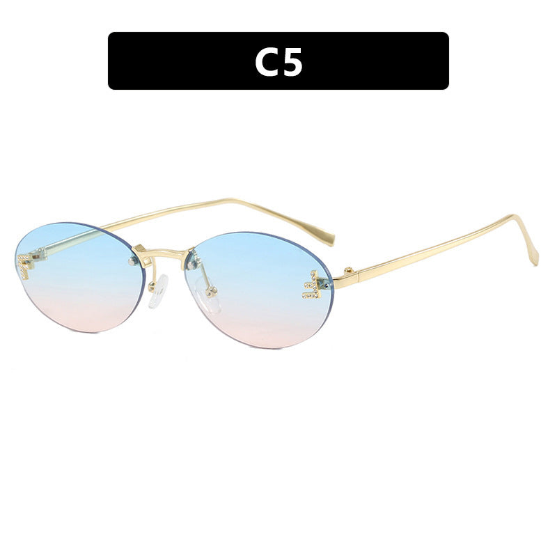 Dame mote trendy solbriller med elegante, runde glass og filigran metallramme Luvikno