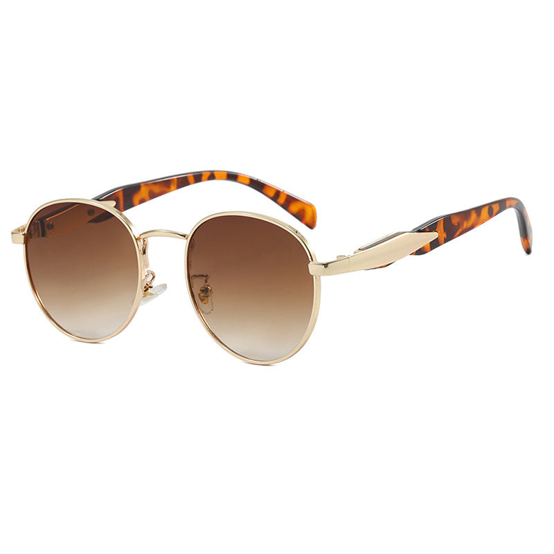 Dame rund solbrille med elegant, gullramme og UV-beskyttelse Luvikno