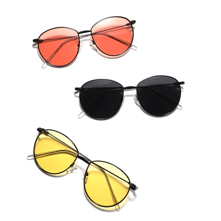 Dame rund solbrille med smal metallramme og polariserte linser Luvikno
