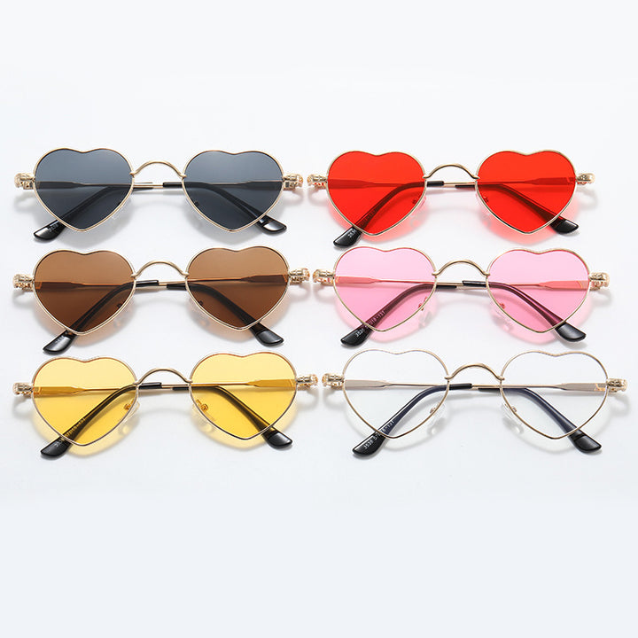 Damer hjerteformet solbrille med filigran metallramme Luvikno