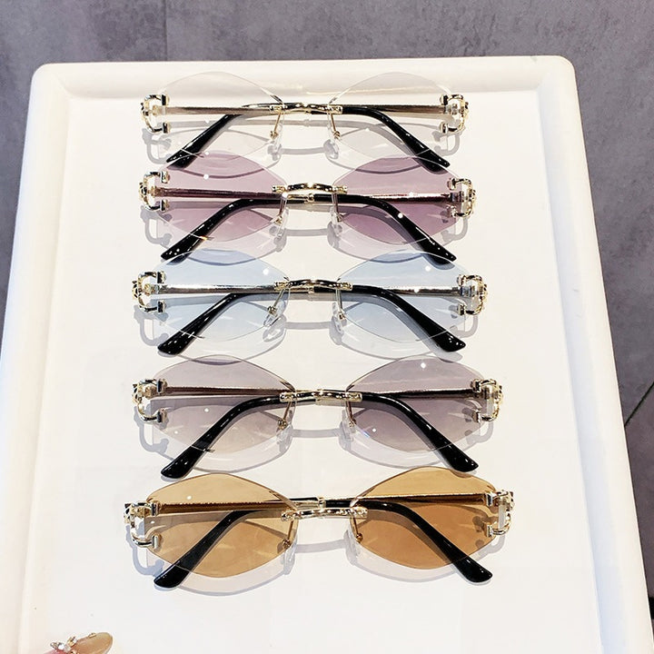 Dame futuristisk solbrille med iøynefallende heksagonalramme og høykvalitets glitrende aksenter Luvikno