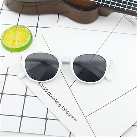 Dame moterik rund solbrille med elegant plastramme Luvikno