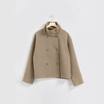 Naisten muotitietoinen lyhyt takki korkealla kauluksella ja kaksinkertaisella nappilistalla Luvik