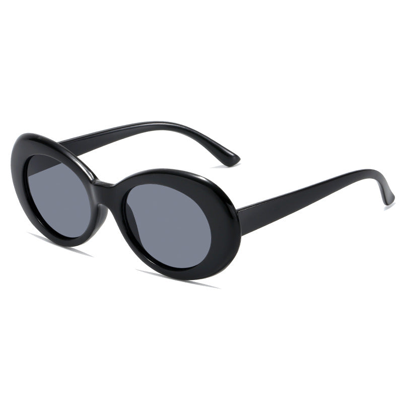 Dame retro-inspirerte solbriller med en elegant, oval ramme Luvikno