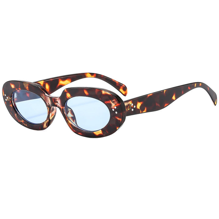 Dame moteriktig solbrille med unikt ovalt ramme og beskyttende glass Luvikno