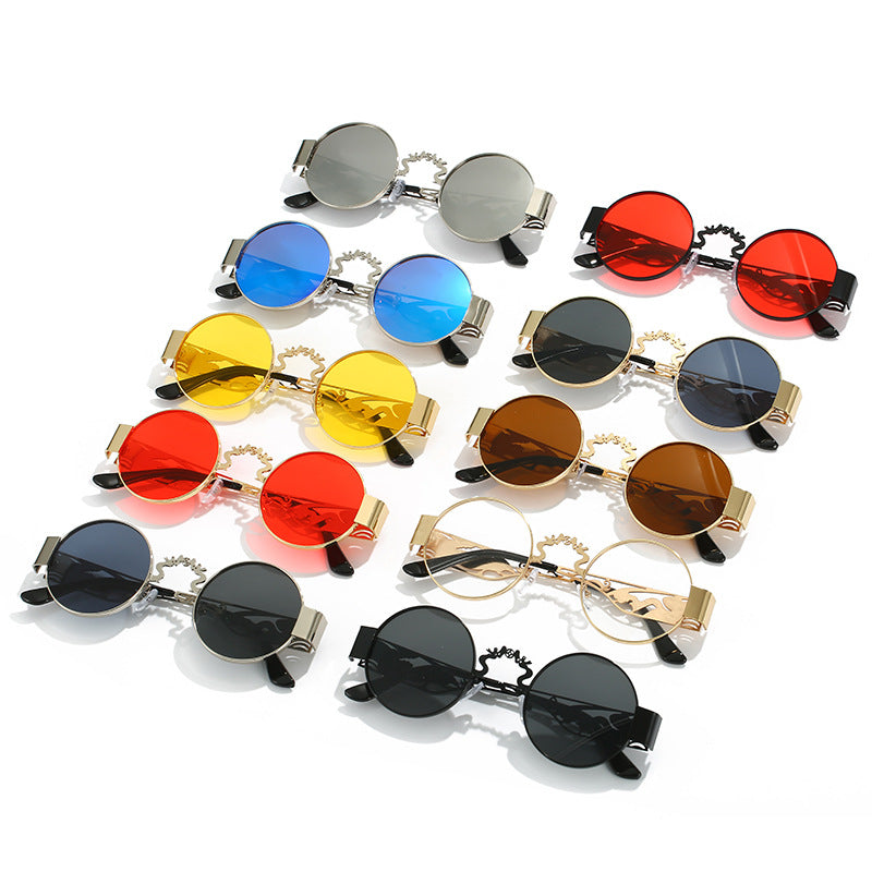 Dame kunstnerisk rundt solbrille med elegant filigranramme Luvikno