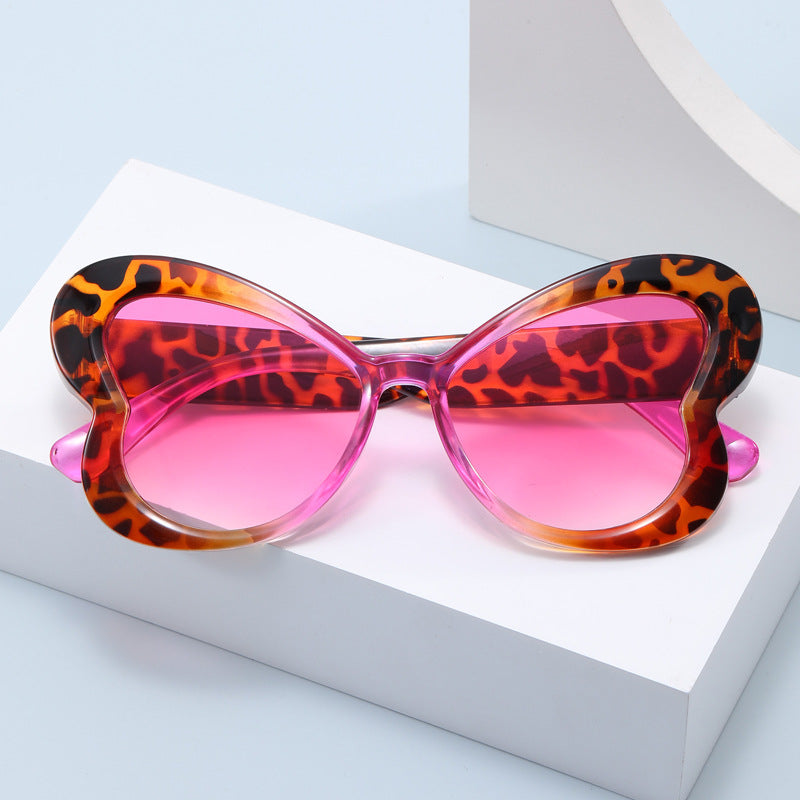 Dame Oversized-solbrille i leken sommerfugl-design Luvikno