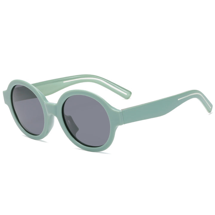 Dame moteriktig solbrille i stilfullt rundt design Luvikno