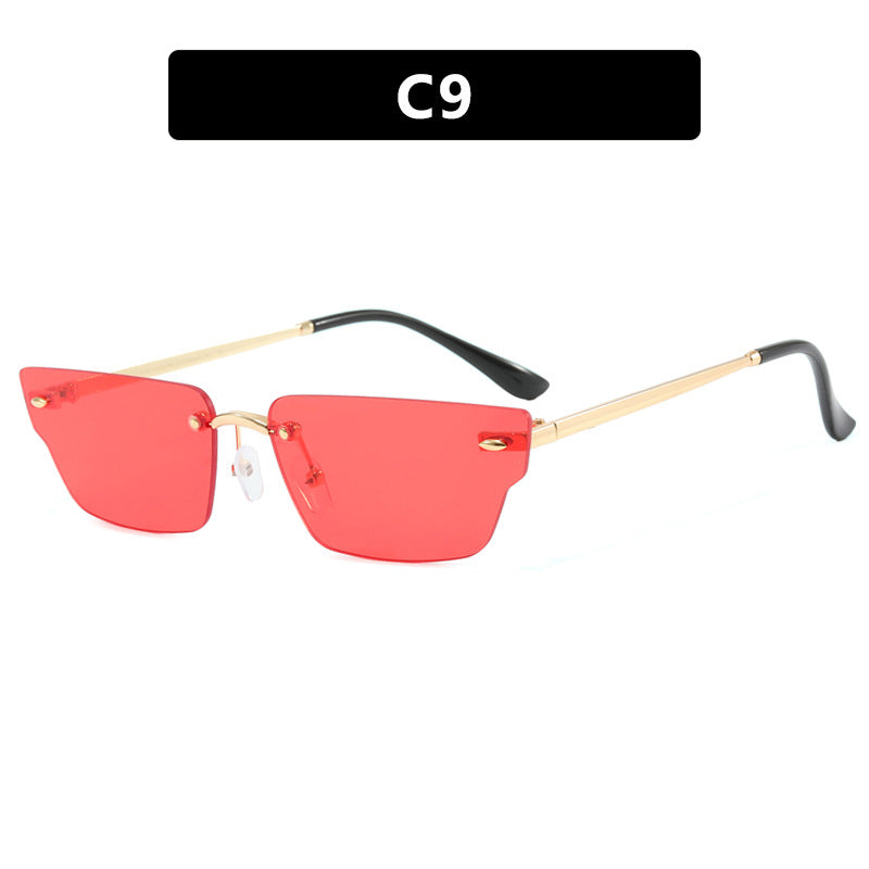 Dame geometrisk solbrille med filigranramme og transparente glass Luvikno