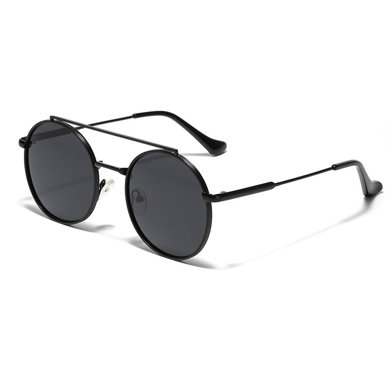 Dame rund solbrille med moteramme Luvikno