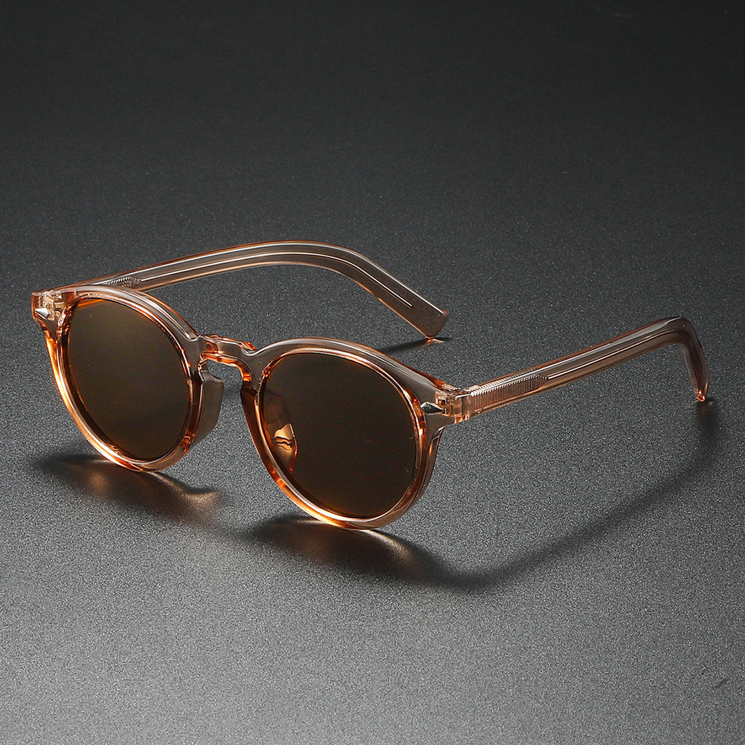 Dame Rund-solbrille med transparent ramme og reflekterende glass Luvikno