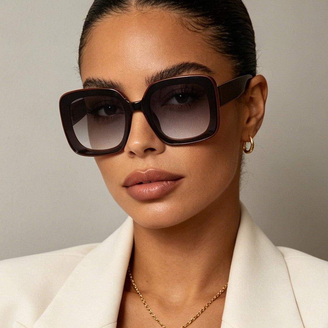 Dame firkantet solbrille med innovativt transparent rammedesign Luvikno