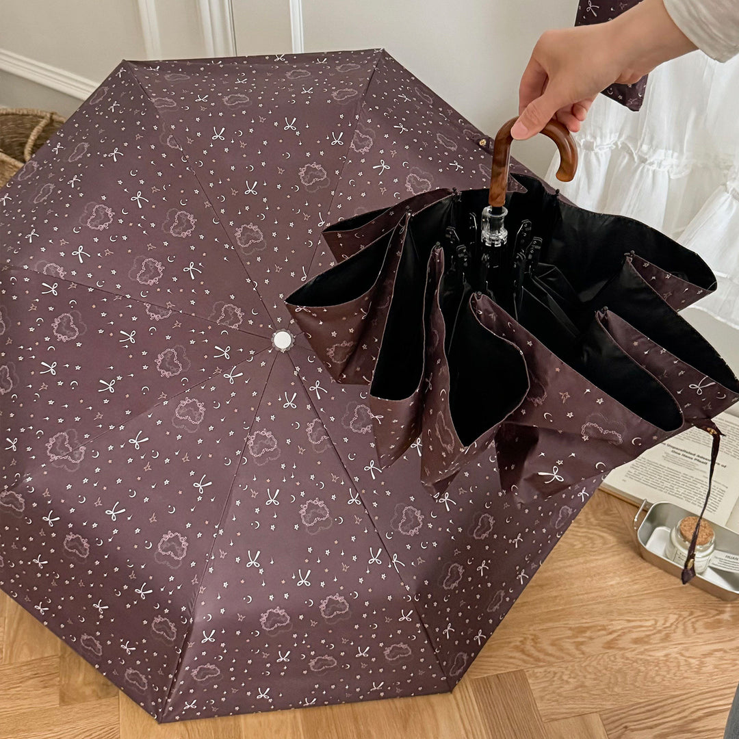 Dame sammenleggbart regnparaply med elegant anhengdesign Luvikno