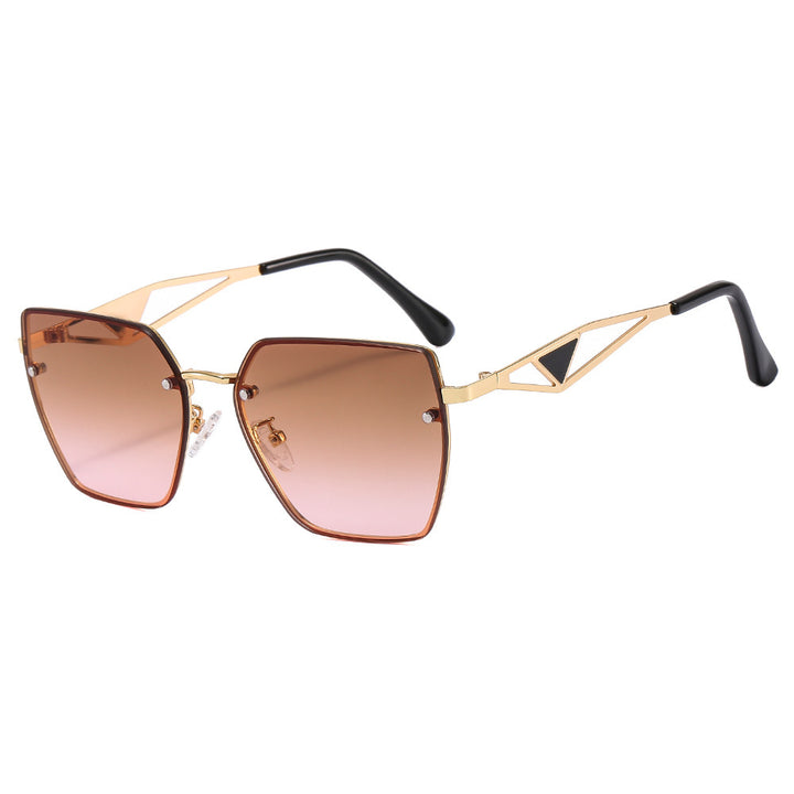 Dame geometrisk solbrille med filigran design Luvikno