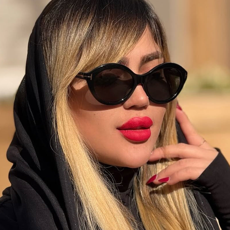 Dame moteriktig solbrille med innovativ oval ramme og UV-beskyttelse Luvikno