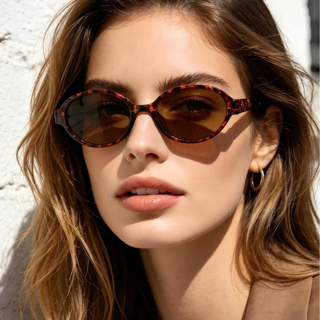 Dame moterik oval solbrille med dyremønster Luvikno