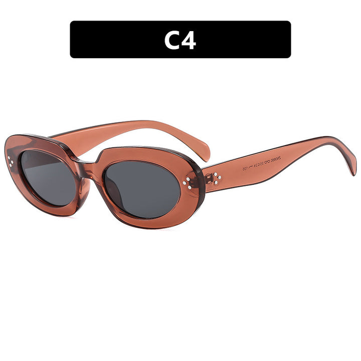Dame moteriktig solbrille med unikt ovalt ramme og beskyttende glass Luvikno