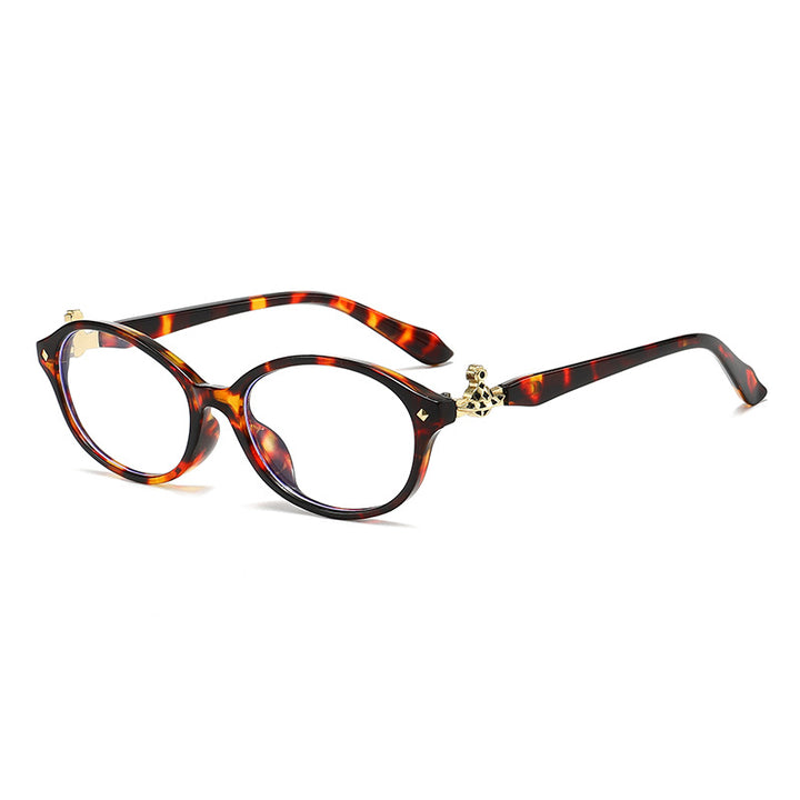 Dame motekunstig brille i elegant ova-design med gyldne aksenter Luvikno