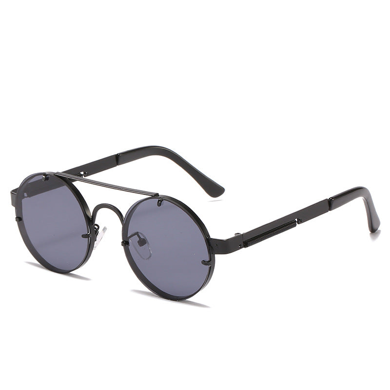 Dame rund designer solbrille med innovativ metallramme og beskyttende linser Luvikno